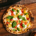 Comandă Pizza pentru Petreceri: De ce Este Alegerea Cea Mai Bună?